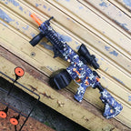 Ultra Shoppings M416 Electric Ball Blaster toy gun in manual and automatic modes, ideal for outdoor shooting games and holiday gifts.